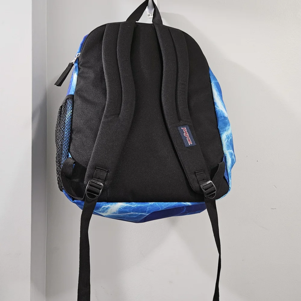 JanSport Blue Backpack with Dynamic Pattern - Picture 3 of 8